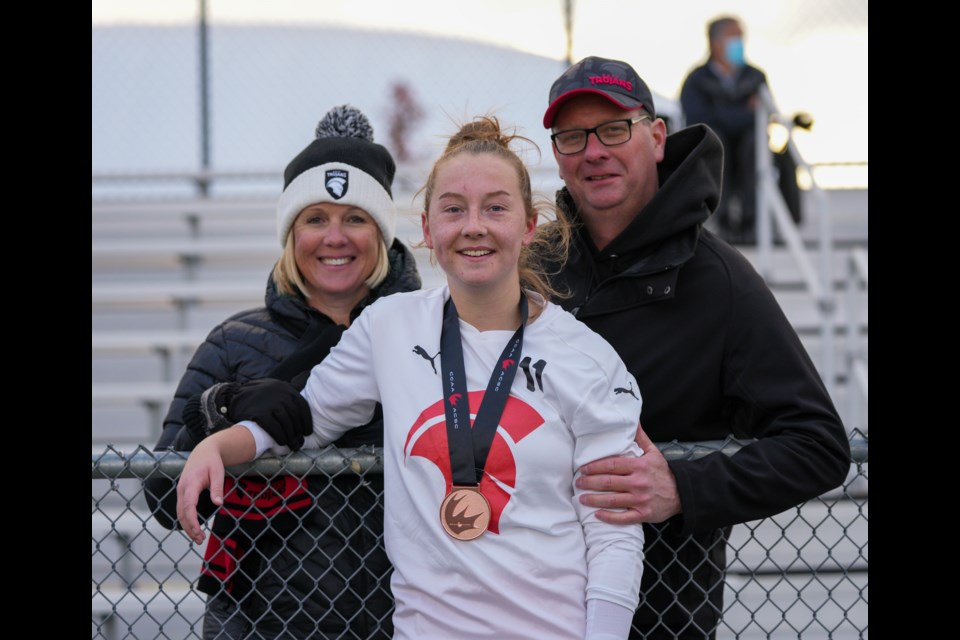 Langdon soccer player Mackenzie Georgsen (No. 11) plays as a central midfielder for the SAIT Trojans soccer team. She helped the squad to their first ACAC title in 19 years in 2021, as well as a bronze medal at the ensuing national championships.