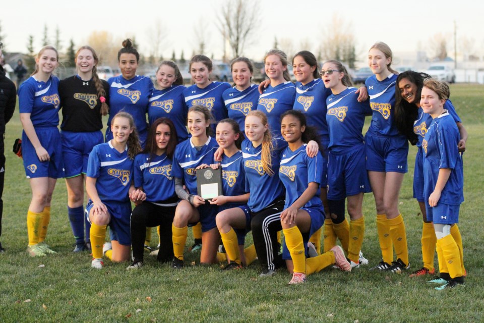 The Bert Church Chargers girls' soccer team earned the RVSA bronze medal Oct. 24, overcoming W.H. Croxford Cavaliers 1-0. Photo by Scott Strasser/Rocky View Publishing
