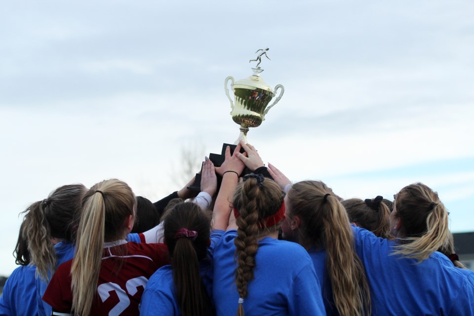 The Cochrane Cobras girls' soccer team retained its 2018 RVSA title Oct. 24, defeating the Springbank Phoenix 2-1 in the gold-medal game. Photo by Scott Strasser/Rocky View Publishing