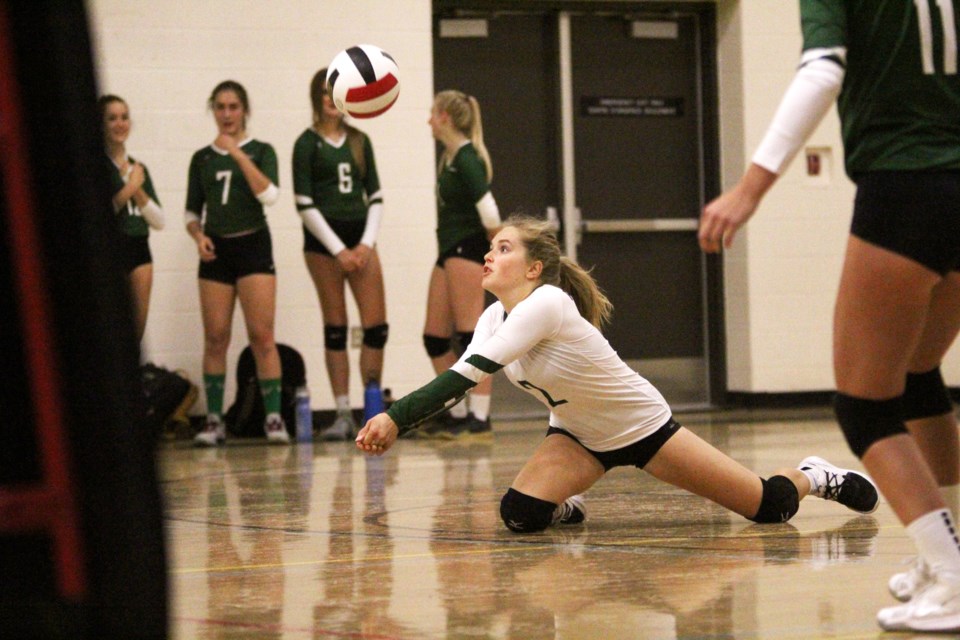 The Springbank Phoenix senior girls' volleyball team won its 2019 season-opener in four sets Sept. 18 against the George McDougall Mustangs. 
Photo by Scott Strasser/Rocky View Publishing