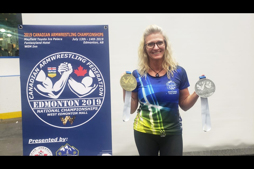 Airdrie's Stacey Foster brought home a gold and a silver medal from the 2019 Canadian Armwrestling Federation's national championships. 
Photo Submitted/For Rocky View Publishing