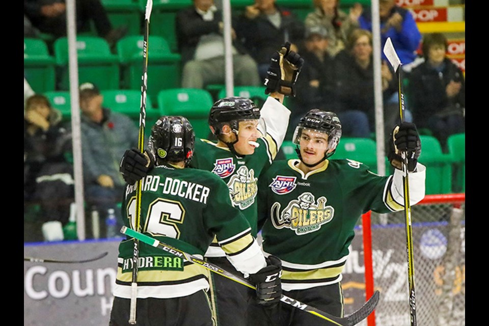 Bragg Creek's Dylan Holloway (middle) will play for Team Canada at the 2021 World Juniors. File photo/Great West Newspapers.