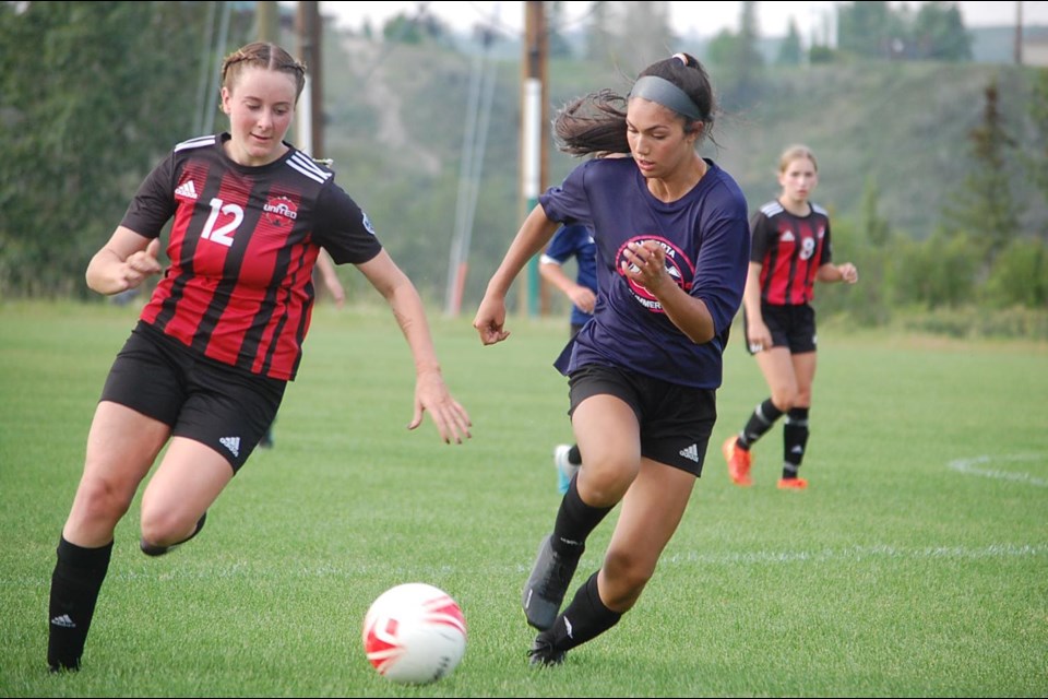 Nearly a dozen U14 soccer players from Cochrane or the surrounding Rocky View County area will be donning the maroon jerseys of Zone 2 at the upcoming Alberta Summer Games in Okotoks July 20 to 23.