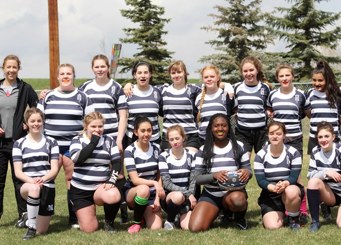 The George McDougall Mustangs girls' rugby team made its competitive debut April 26 at a rugby 7s jamboree at Central Memorial High School in Calgary. 
Photo by Scott Strasser/Rocky View Publishing