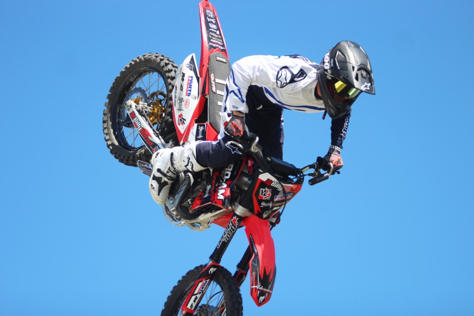 The performances of freestyle motocross rider Billy Kohut were among the highlights of this year's Bikes and Bulls charity fundraiser. The event, put on by the Airdrie Oilmens Association, took place July 26 to 28 at the Airdrie Airpark. 
Photo by Scott Strasser/Rocky View Publishing