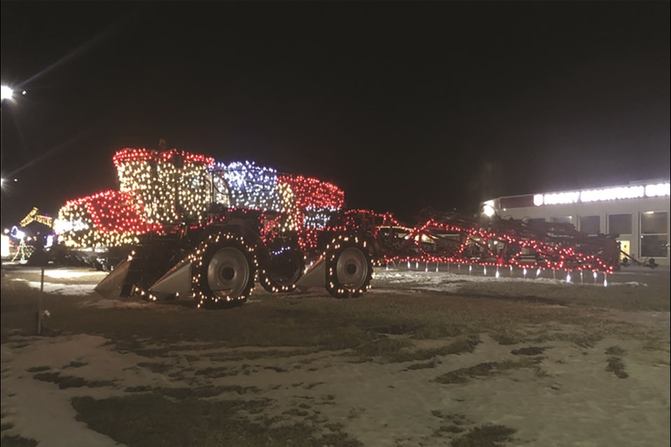Rocky Mountain Equipment in East Balzac adorned some of its farming equipment with Christmas lights for people to enjoy as they drove along Highway II. Photo submitted/For Rocky View Weekly
