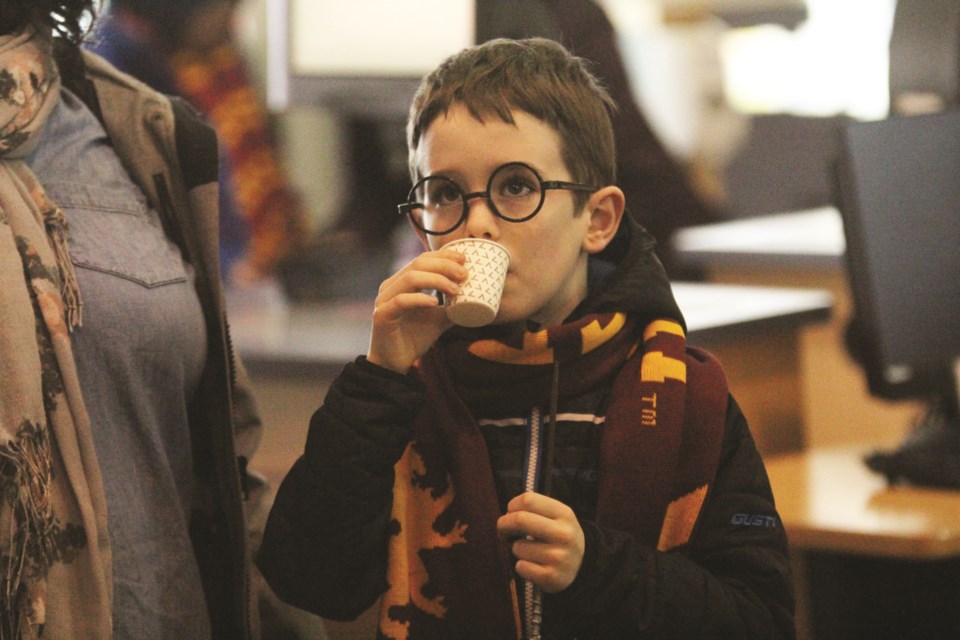 Airdrie Public Library hosted its third annual Harry Potter Day March 7. The event included plenty of wizarding wonder for the whole family, including a house sorting ceremony, a scavenger hunt, a Dobby Sock Throw, a themed photo booth and more. Photo: Scott Strasser/Airdrie City View