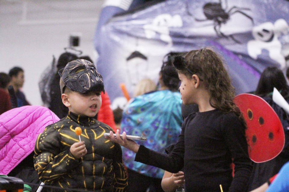 The Halloween spirit came early to Balzac Oct. 19, when New Horizon Mall hosted the Halloween Children's Party. The event, in partnership with Haunted Calgary, included Halloween-themed bouncy castles, free admission to Haunted Calgary's Family Fright Thrill Zone, arts and crafts stations, games and more. Photo by Scott Strasser/Rocky View Publishing
