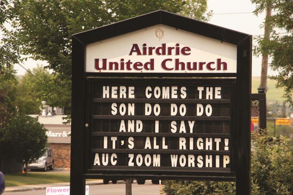 The sign outside of Airdrie United Church does its best Beatles impression on July 28. Photo by Jordan Stricker/Airdrie City View