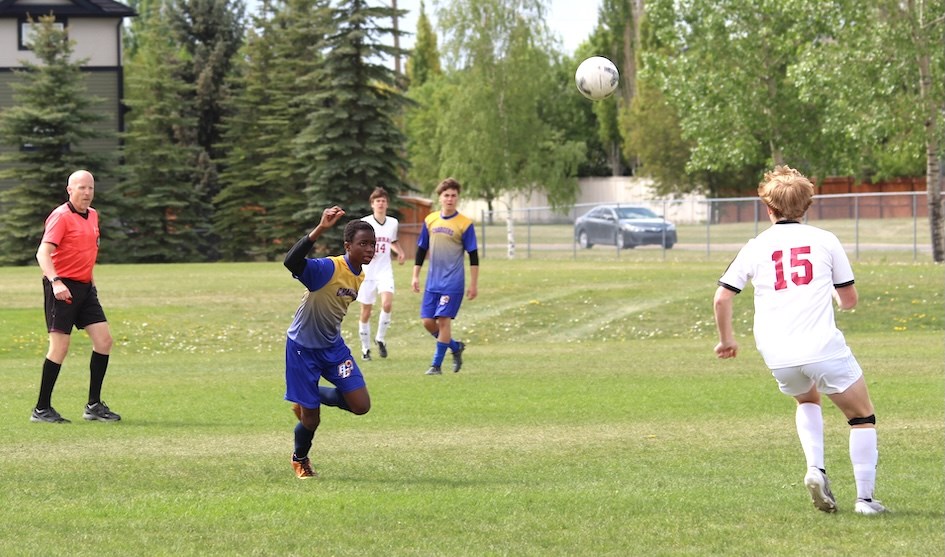 Bert Church Chargers play Cochrane Cobras for bronze in Rocky View Schools High School Soccer. 