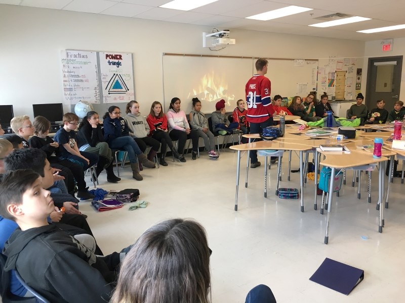 Grade 6 students at C.W. Perry School use a consensus decision-making process learned in social studies to decide how to use a $500 Educational Partnership Foundation grant.