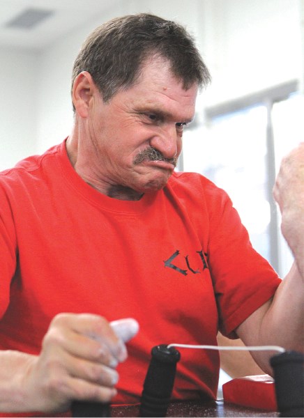 Airdrie&#8217;s Clifford Adams competes in the 2010 Destination Cycle Alberta Arm Wrestling Provincials held June 5 at Genesis Place.