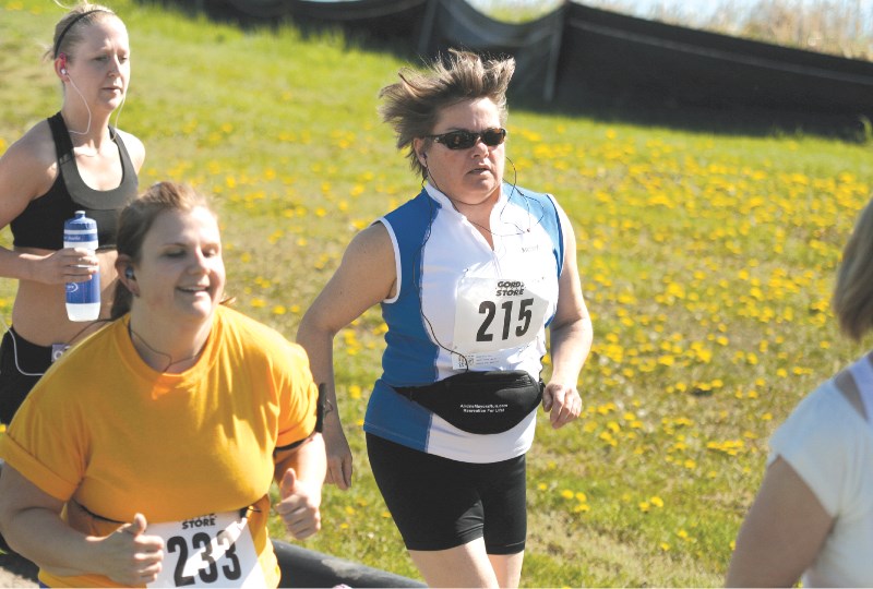 Airdrie Mayor Linda Bruce takes part in the five-kilometre race during the fourth annual Mayor&#8217;s Recreation For Life Run and Walk at Genesis Place, June 6. Runners