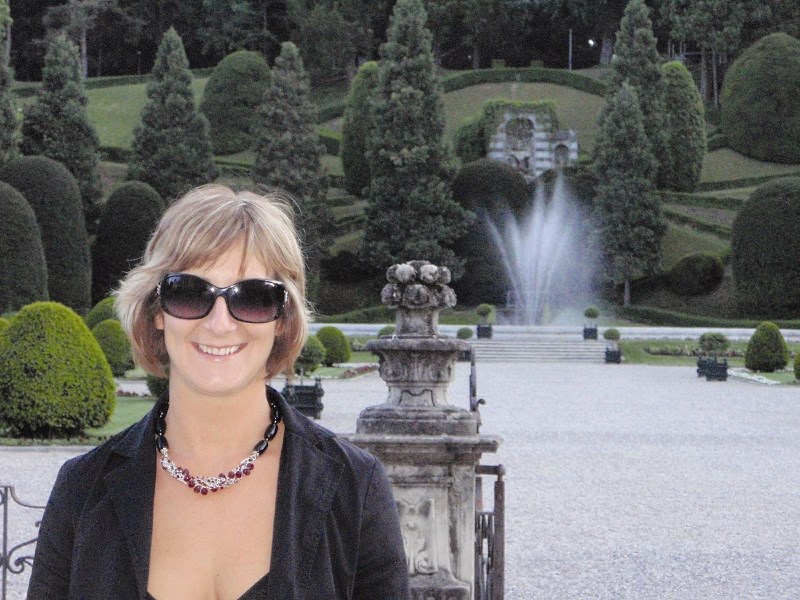 Tricia Andres McDonald stands in the gardens of City Hall in Varese, Italy where she met the mayor Attilio Fontana in May.