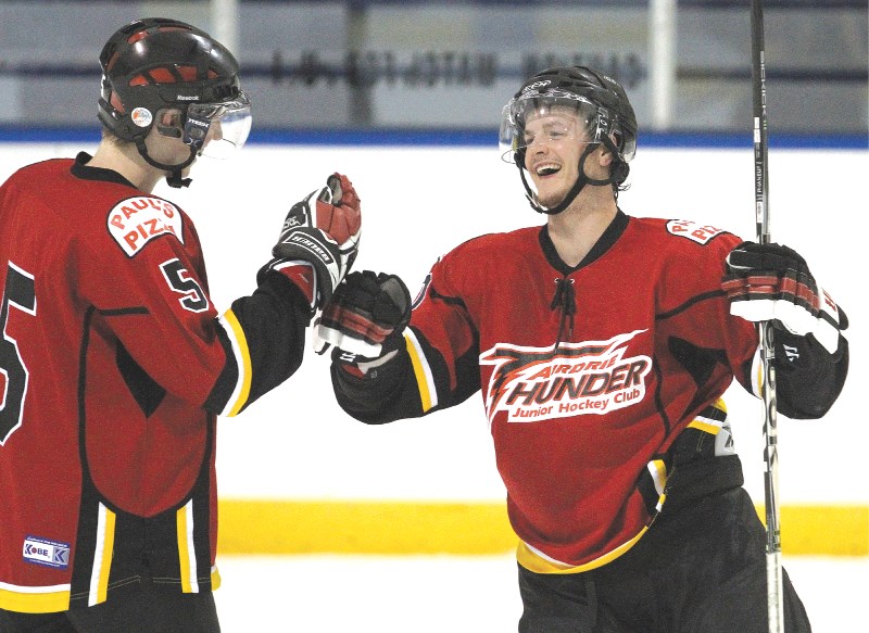 Thunder teammates Taylor Crossley and Alex Diduch celebrate a goal during Airdrie&#8217;s 9-0 win over the Banff Academy Bears at the Ron Ebbesen Arena on Oct. 22. The