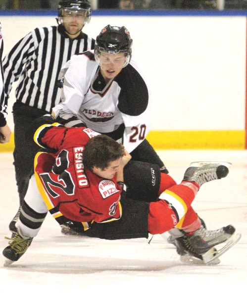 The Airdrie Thunder&#8217;s Brandon Esposito goes down during a fight with Red Deer Viper Joel Pelletier during the teams&#8217; Nov. 5 matchup at the Ron Ebbesen Arena.