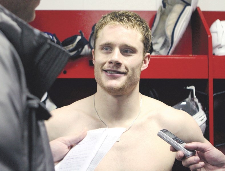 Airdrie&#8217;s Dana Tyrell, shown here answering questions following Tampa Bay&#8217;s visit to Calgary in December, played against his friend and former teammate Zach