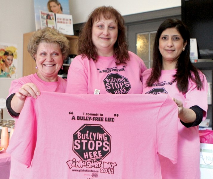 Renue 2&#8217;s Marilyn Klamski, Shonese Hogarth and Meena Begga pose with their pink shirts, celebrating the 2011 Pink Shirt Day, Feb. 23. Renue raised funds throughout the