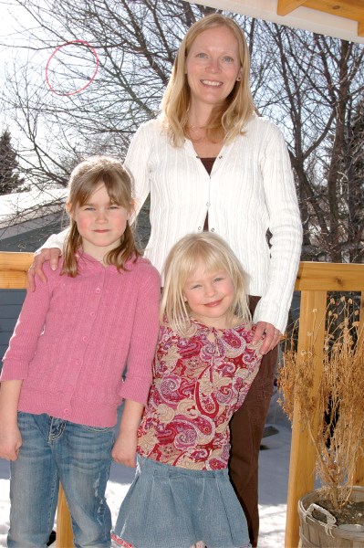 Ward 1 Trustee Norma Lang poses for pictures with her daughter Sydney Lang (right) and her friend Samantha Schultz.