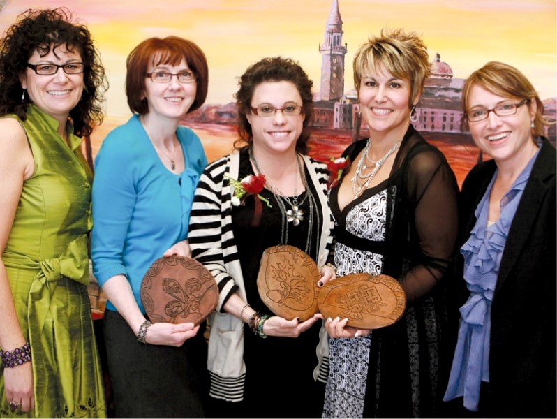 (Left to right) Sherry Shaw-Froggatt, event organizer, with the 2011 Amazing Airdrie Women; Karen MacDonald; Chelsey Dawes and Jan Morrison. Far right is guest speaker Sandi
