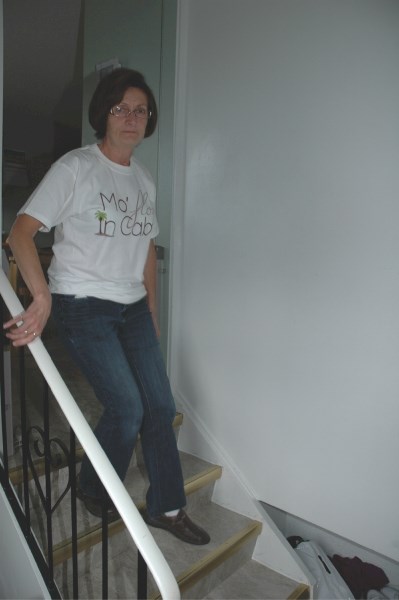 Gayle Clayton is seen here walking down the stairs in her home right after her liberation treatment in Cabo San Lucas last year. Before the surgery, she was unable to walk up 