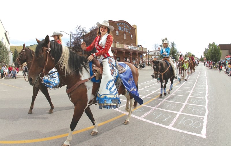 Airdrie Rodeo Princess Rebecca McKay rides her horse Kyuse in this year&#8217;s Labour Day Parade in Cochrane.