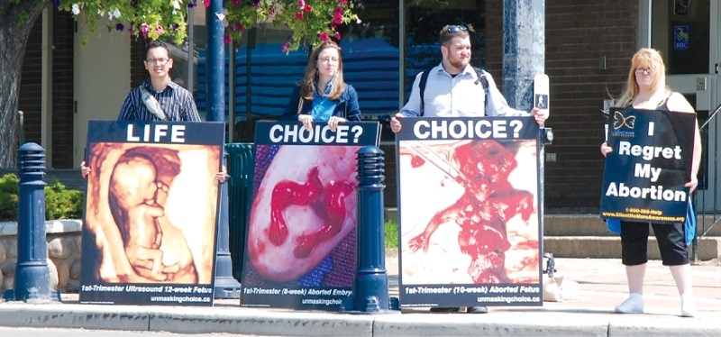 These pro-life protestors, representing The Canadian Centre for Bio-ethical Reform, caused a stir in downtown, June 4, prompting City council to review its regulations