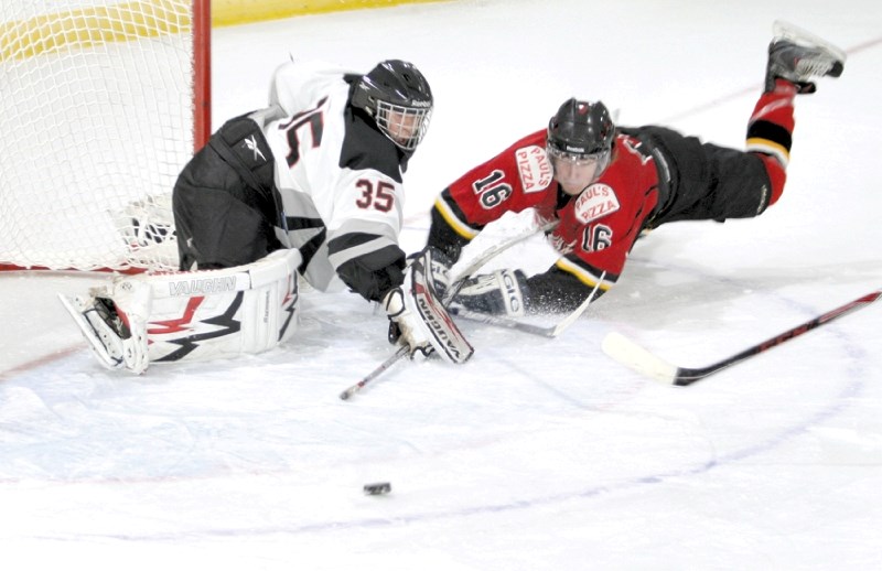 The Airdrie Thunder&#8217;s Matt Flette crashes into Red Deer Vipers netminder Jarren Nickle during exhibition action Sept. 16 at the Ron Ebbesen Arena. The Thunder&#8217;s