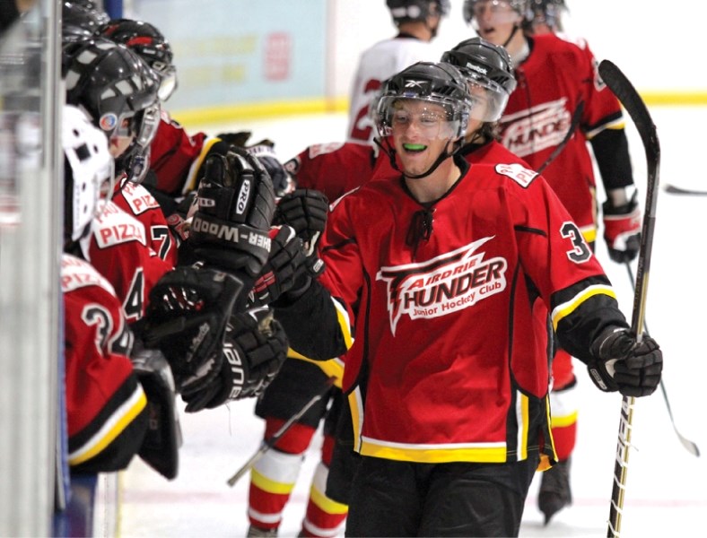 Airdrie Thunder Ryan Gould celebrates with his teammates, Sept. 23. The Airdrie Junior B Thunder racked up 18 goals in three games in the regular season&#8217;s first weekend.