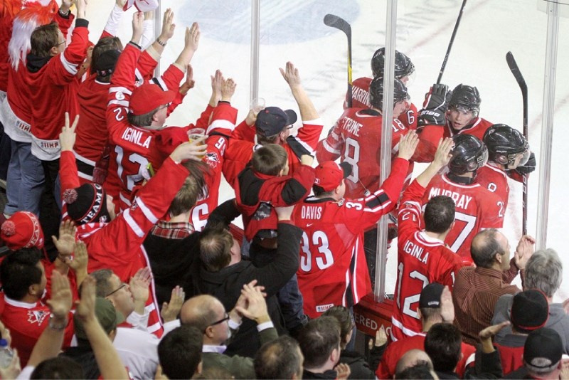 Team Canada celebrates its second of four third-period goals en route to a 6-5 loss to the Russians in semi-final action during the 2012 IIHF Junior Hockey Championship at