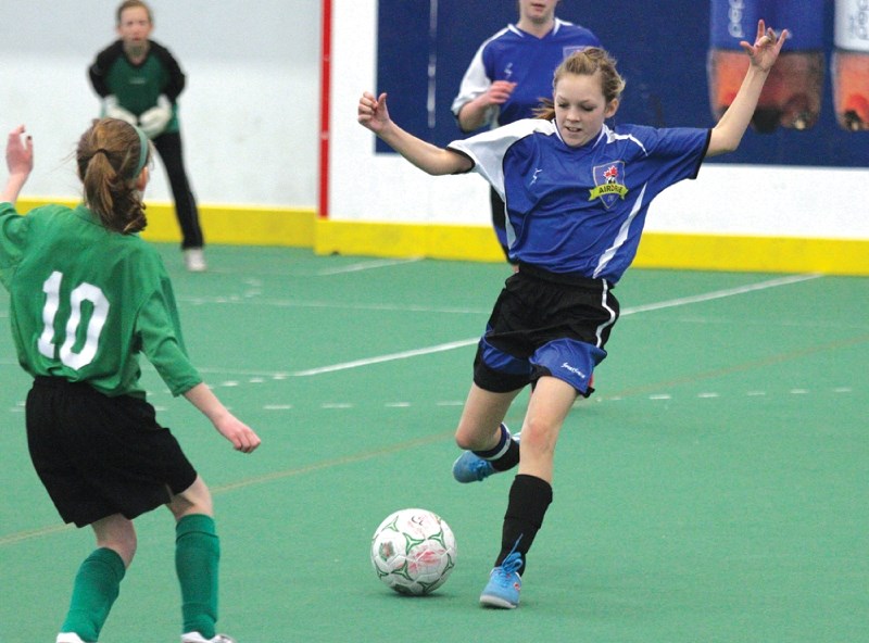 Airdrie girls&#8217; U14 soccer player Teigan Cooper lines up a big shot during the inaugural Blizzard Buster indoor soccer tournament held Jan. 13-15 at Genesis Place.