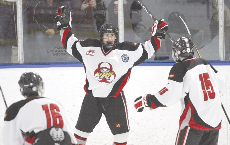 Airdrie forward Zach Giroux celebrates his second period goal during the Xtreme&#8217;s 6-3 game-two win over the Medicine Hat Hockey Hounds at the Ron Ebbesen Arena, Feb. 25.