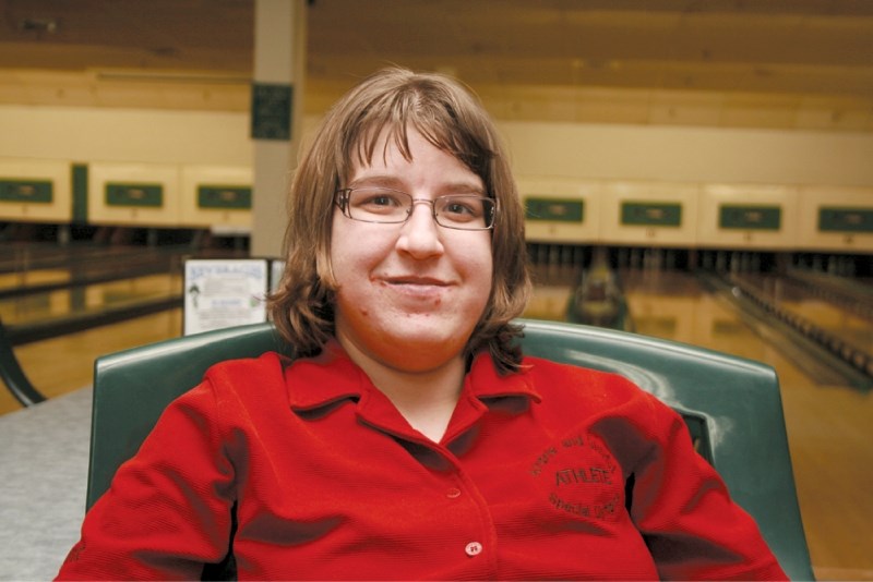 Jennifer Boyd, 24, seen taking a break during a recent bowling game at Shamrock Lanes, was named Special Olympics Airdrie&#8217;s athlete of the month for March. She competes 