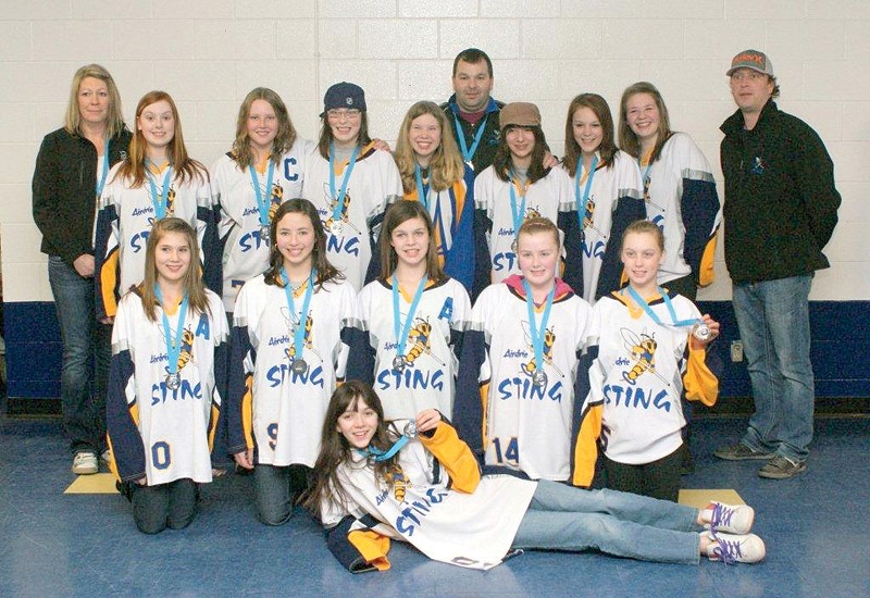 The Airdrie Sting U14 ringette team proudly displays the silver medals it earned at the provincial championships in St. Albert on March 18. The squad lost in the final to the 