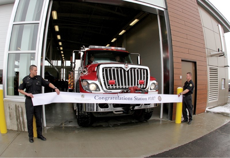 Rocky View Fire Services Station 107 officially opened its doors April 14, with MLA Ted Morton driving a fire truck through a ribbon to mark its opening
