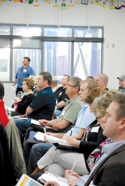 Members of Airdrie&#8217;s business community take in a presentation from City of Airdrie staff during a forum, June 7. The event was put on by the City to garner feedback on 