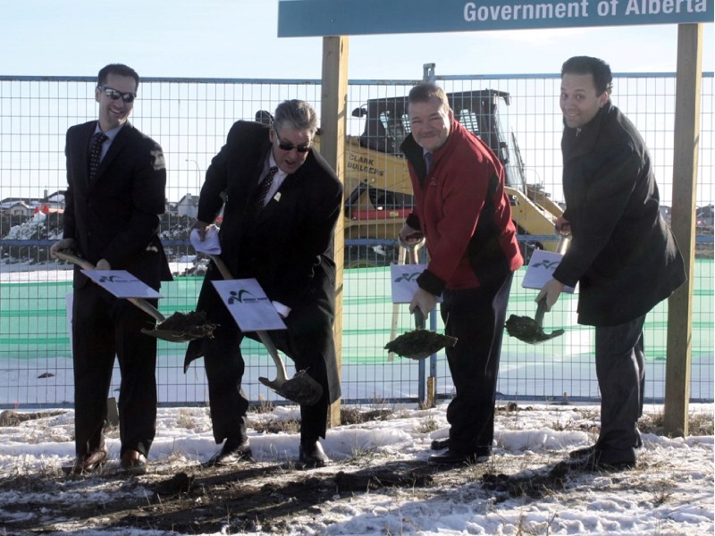 From left: MLA Rob Anderson, Rocky View Schools Trustee Chair Bruce Pettigre, Airdrie Mayor Peter Brown and Justice Minister Jonathan Denis break ground Nov. 16 for the new