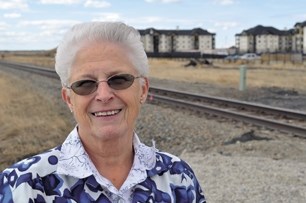 Betty Melik stands near the rails where her grandson, Andrew, died 12 years ago. Melik is part of Operation Lifesaver, a Canadian organization dedicated to educating citizens 