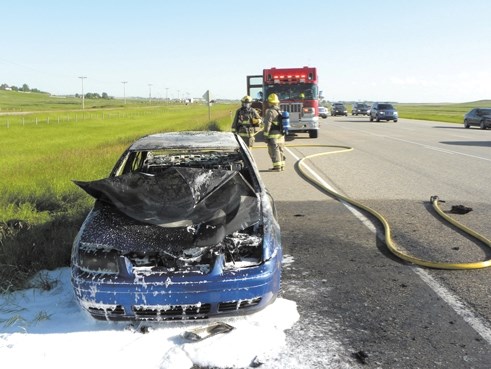 This car caught fire on the side of Highway 2 south of Airdrie on July 10. No one was injured in the incident and the cause of the fire was determined to be of mechanical