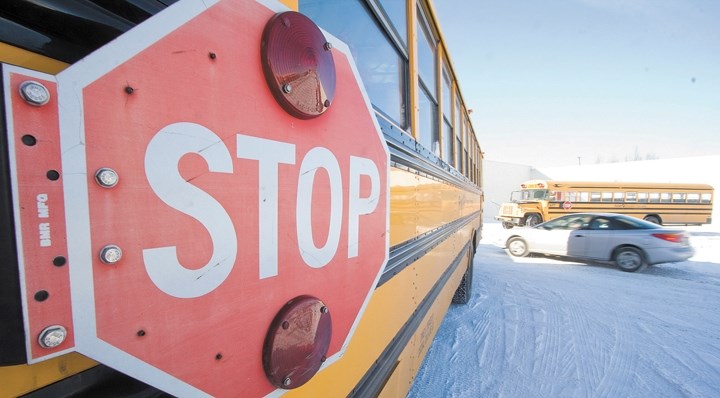 City council voted not to change a bylaw that would require drivers to stop behind school buses when they are loading or unloading students, May 5.