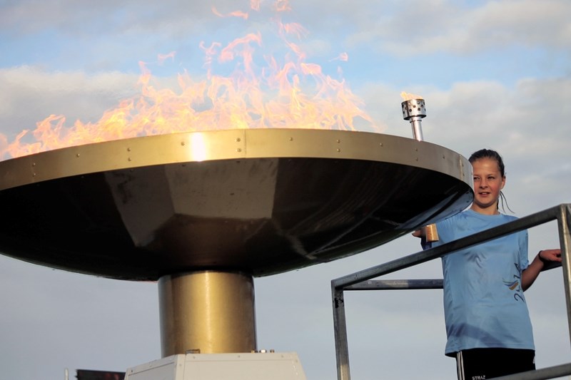 Jaden Straschnitzki lit the 2014 Alberta Summer Games caldron during the Opening Ceremonies at Ed Eggerer Athletic Park on July 24. See more 2014 Alberta Summer Games