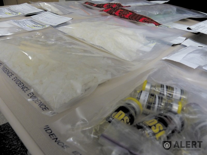 Some of the drugs collected as evidence when the Alberta Law Enforcement Response Team (ALERT) and RCMP executed search warrants at homes in Red Deer, Calgary and Airdrie on