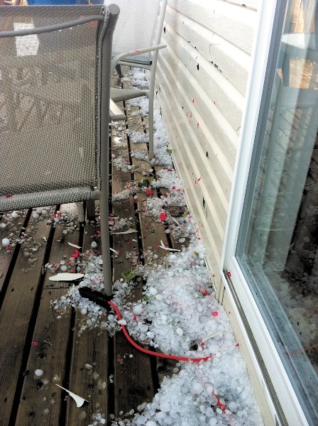 Kristy Reimer&#8217;s siding on her home in Luxstone will need to be repaired after the hail storm that hit Airdrie on Aug. 7.