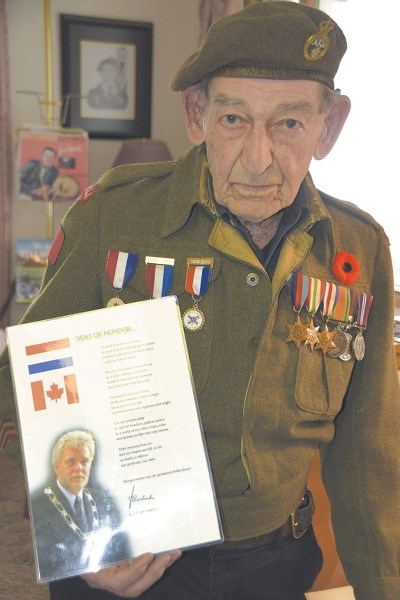 This letter of thanks from the Dutch people was presented to Second World War veteran Art Grenier during a pilgrimage from Mayor J.J. von Overbeeker of Hellendoorn.