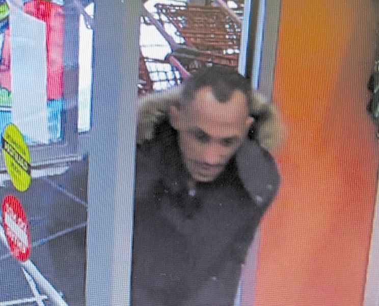 Airdrie RCMP are looking for this man in relation to a quick cash scam at the Airdrie Petland on Jan. 2.