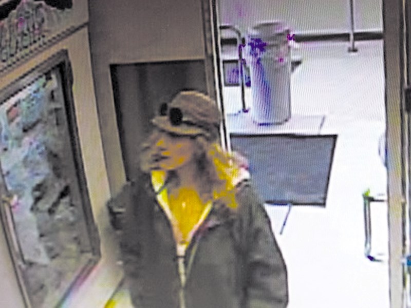 RCMP is hoping the public can help identify a woman who made off with bottles of liquor from the Real Canadian Liquor Store on Feb. 13.