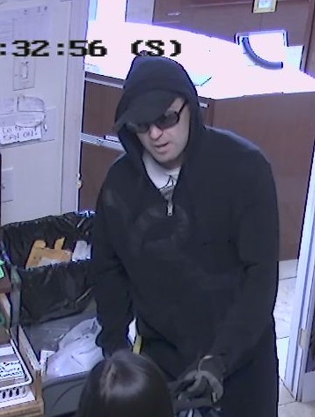 This man is wanted in connection with an armed robbery at a jewellery store on Airdrie&#8217;s Main Street on April 20.
