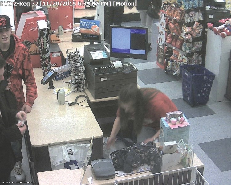 RCMP is hoping someone will recognize two men caught on video surveillance allegedly using stolen gift cards at a store in CrossIron Mills on Nov. 20 and 21.
