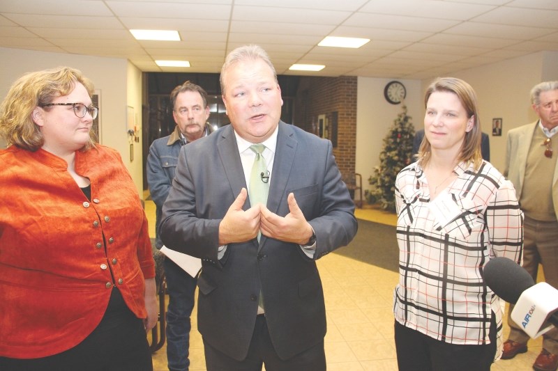 Health Minister Sarah Hoffman (left), Mayor Peter Brown (centre) and Chair of the Airdrie Health Foundation Michelle Bates spoke to reporters after a meeting on Dec. 15 to