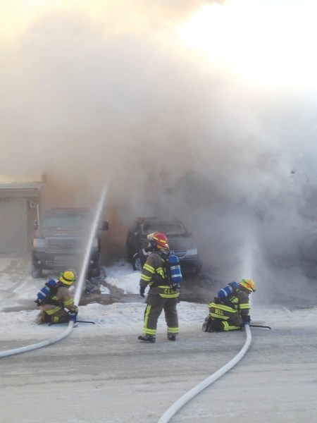 Firefighters from the Airdrie and Crossfield Fire Departments fought a blaze at a home in Morningside on Boxing Day.